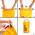Wodoodporna torba RESTUBE Drybag 5 l z paskiem na ramię, żółta 